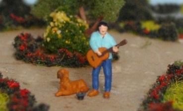 Straßenmusikant mit Hund