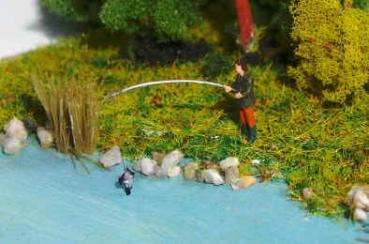 Angler mit Fisch